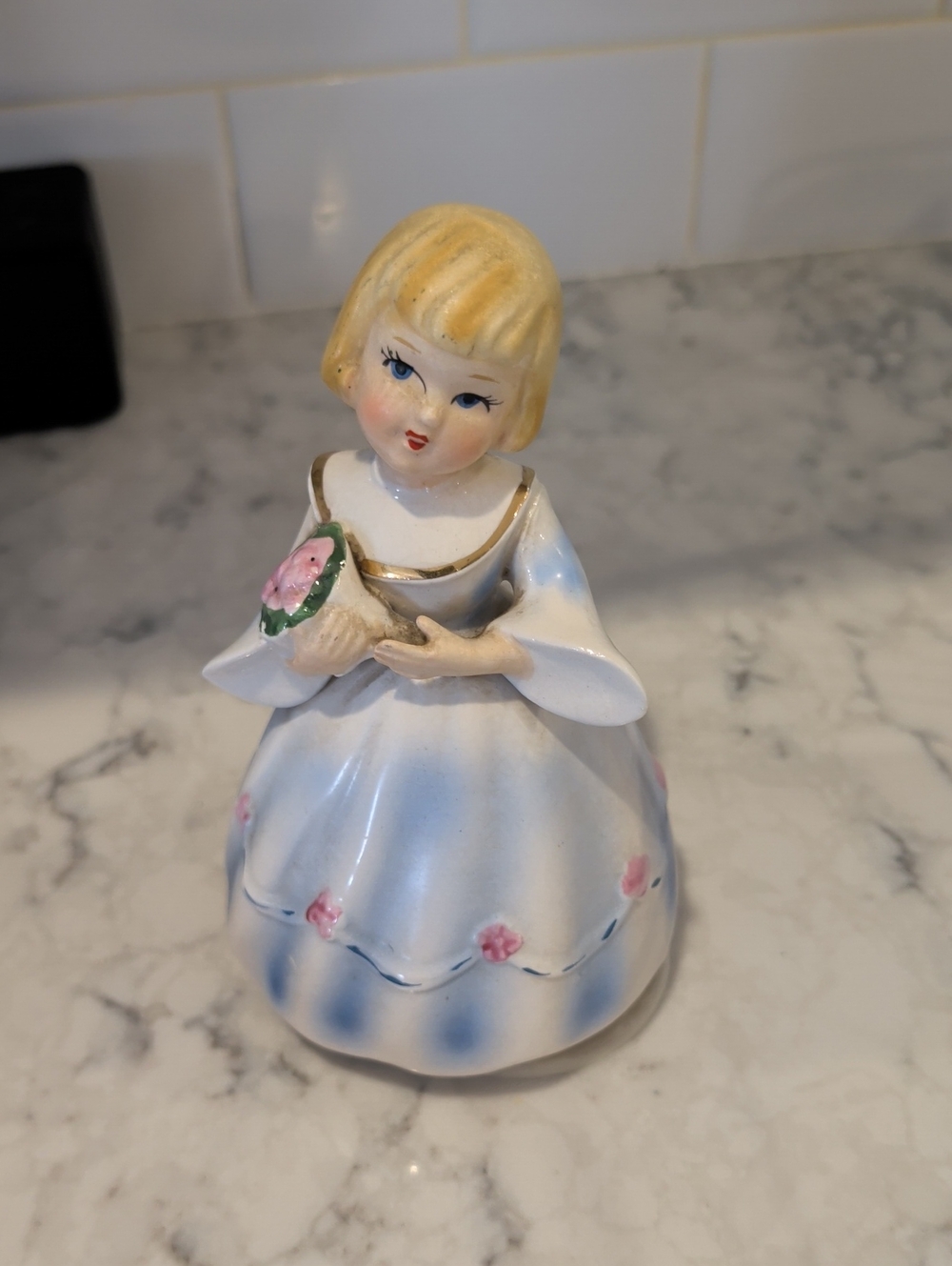Vintage Porcelain Girl Figurine in White and Blue with Pink Accents Music Box